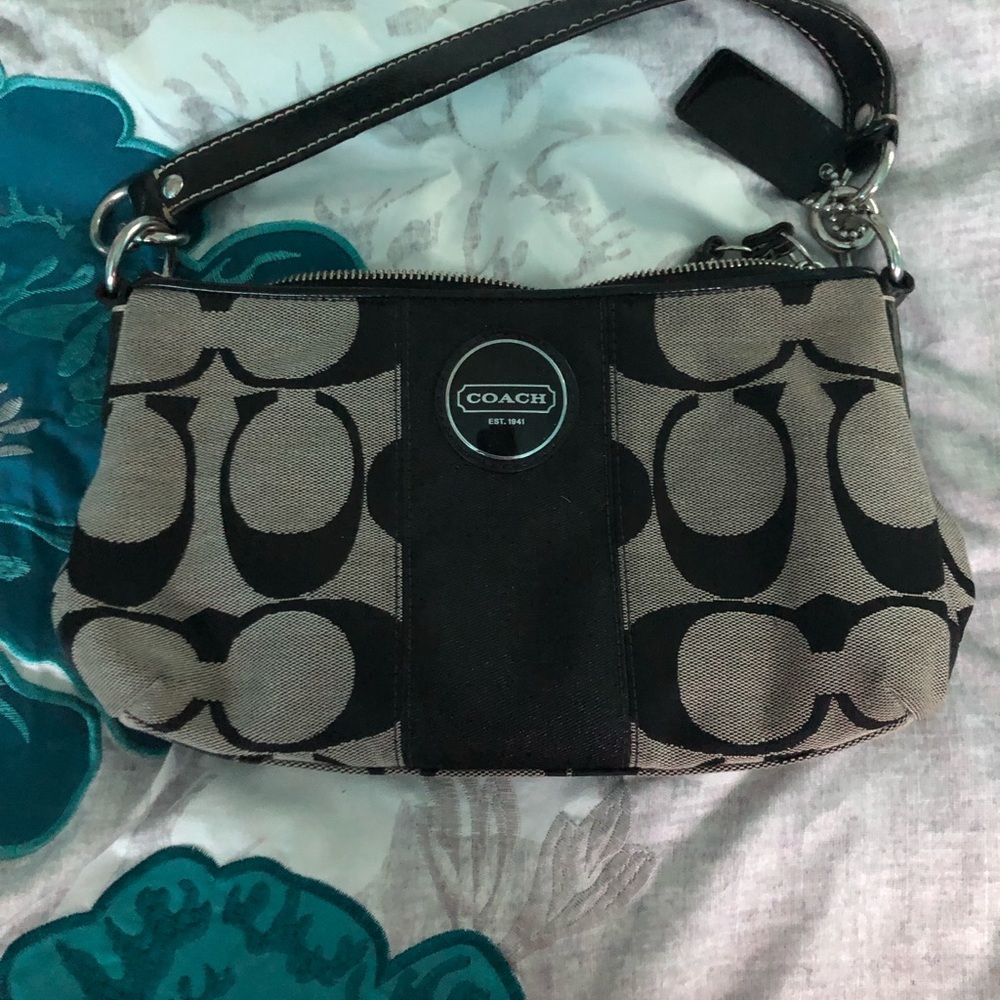 Small black and grey coach purse